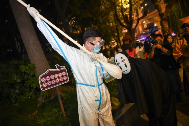 Citizens and tourists dress up and take part in a Halloween parade in Shanghai, China, October 31, 2023. 