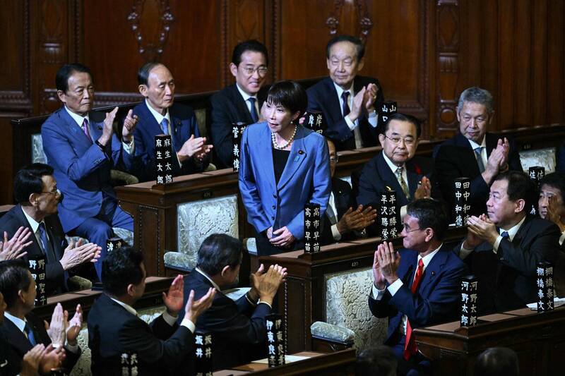 日本临时国会今天开议，进行首相指名投票，自民党总裁高市早苗以237票过半数，获得众议院指名成为日本首位女首相。（法新社）